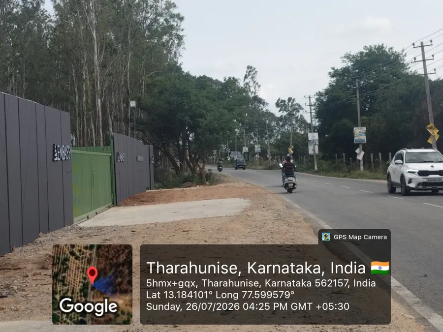 Embassy Knowledge Park site frontage and access gate along Bellary Road, Yelahanka — July 2026